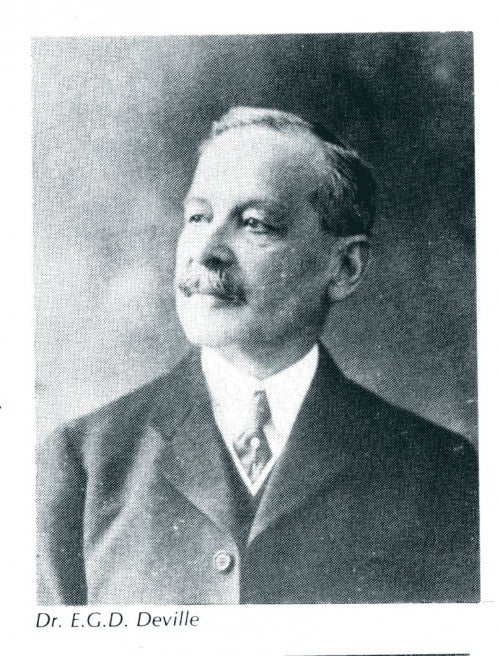portrait photo of man (Dr. Deville)