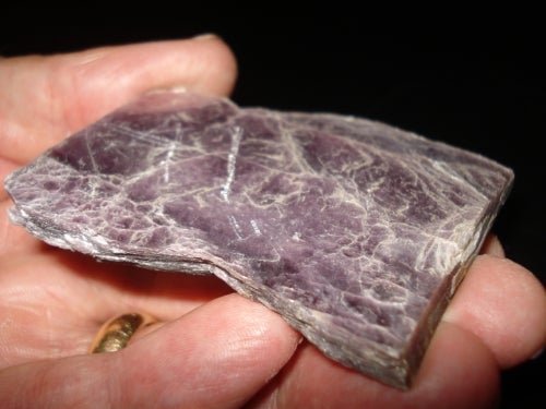 purple mica in hand