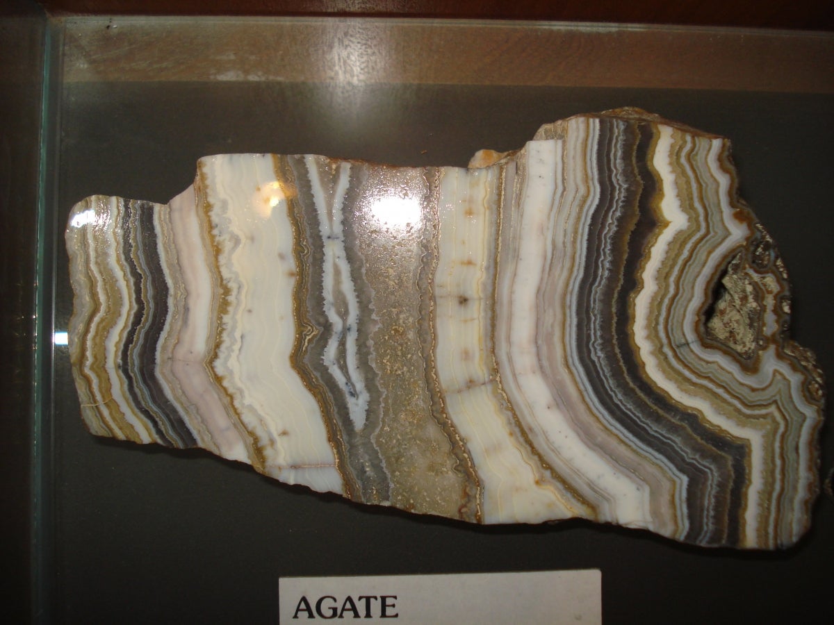 brown, white and grey banding in agate specimen