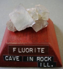 Fluorite mounted on a wood base with a label