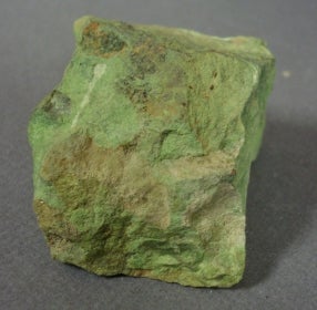 Piece of bright green mineral