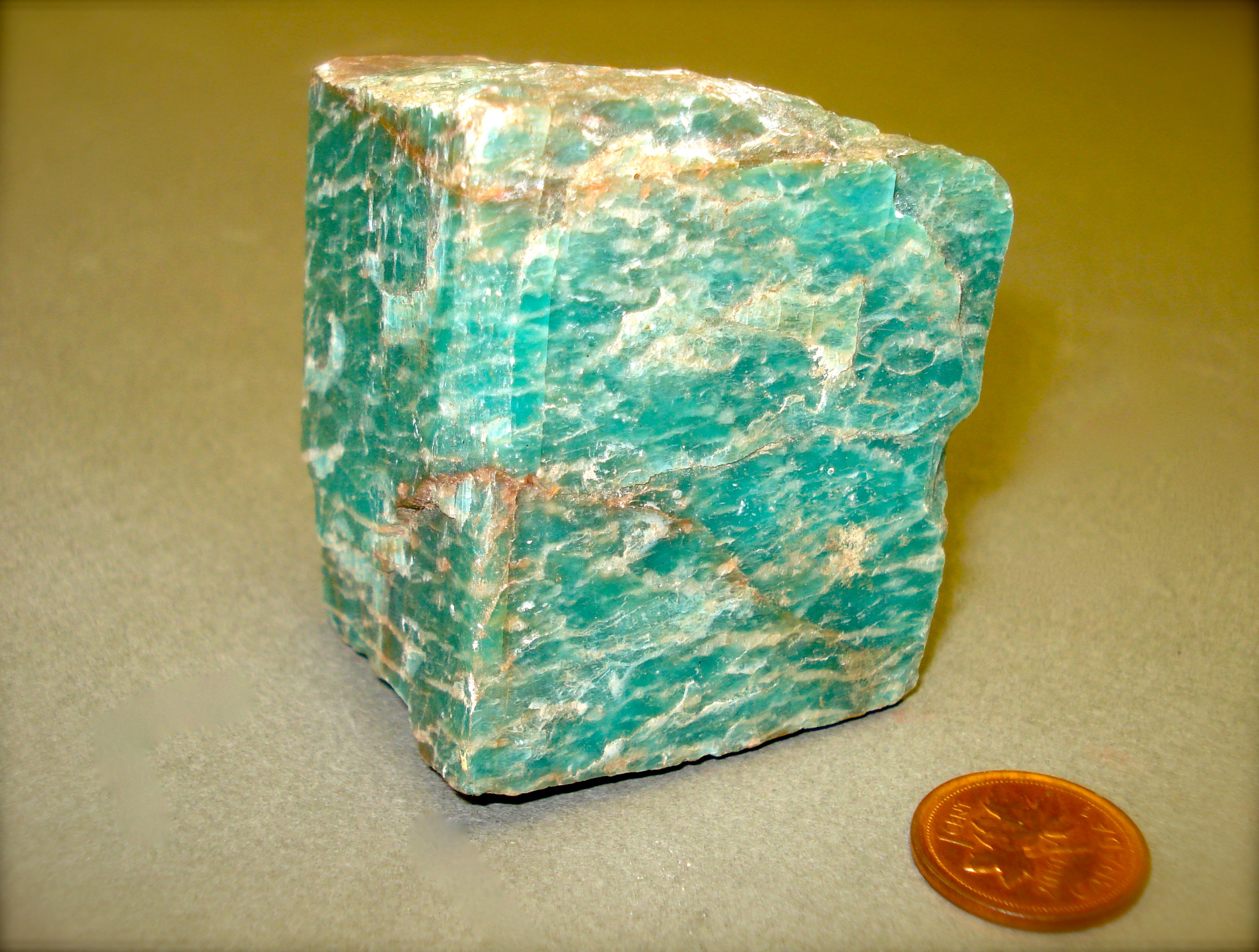 Cube-like block of vibrant green mineral