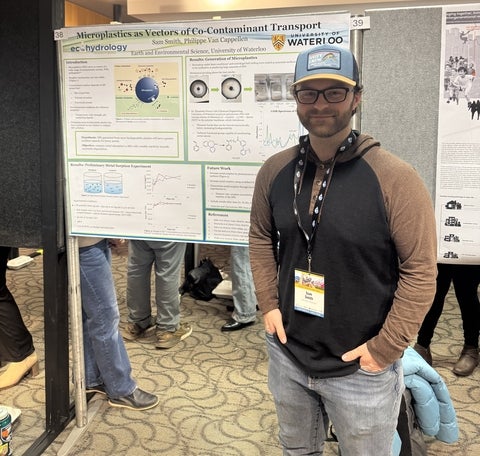 Sam with his poster at WWD