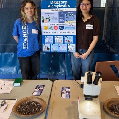 Tia and Huong at the Microplastics station