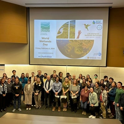 Group photo of poster and lecture participants.