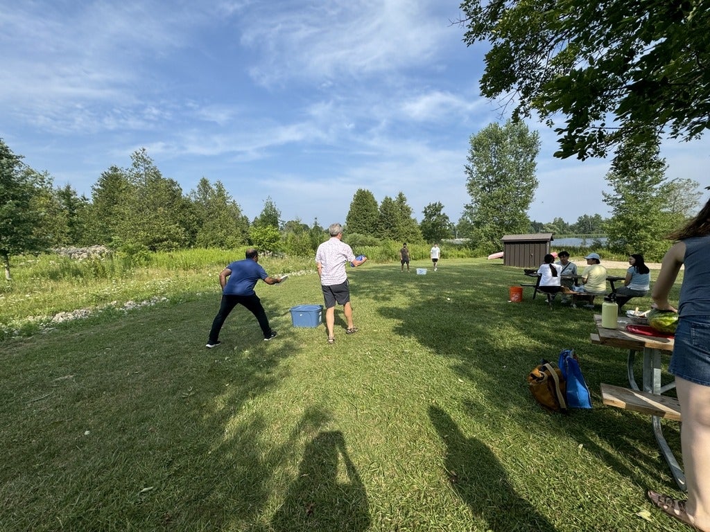 Philippe and Fereidoun playing frisbee