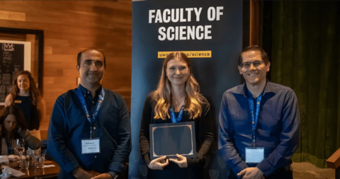 Katie holding the "Dean's Award" with Fereidoun and Brian