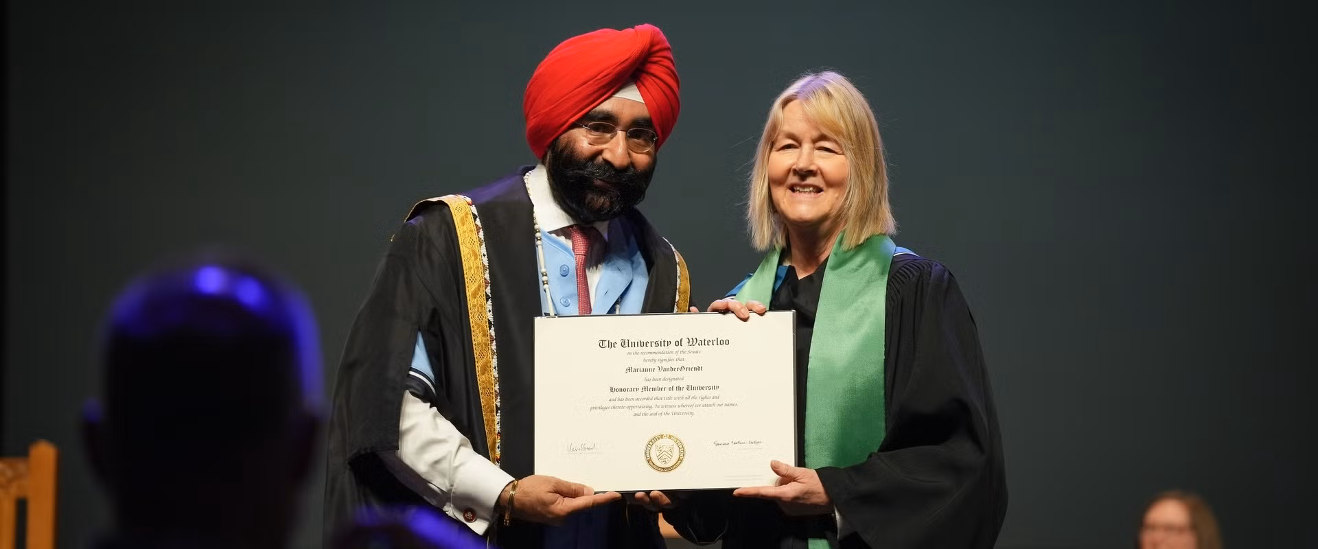Marianne getting award at convocation