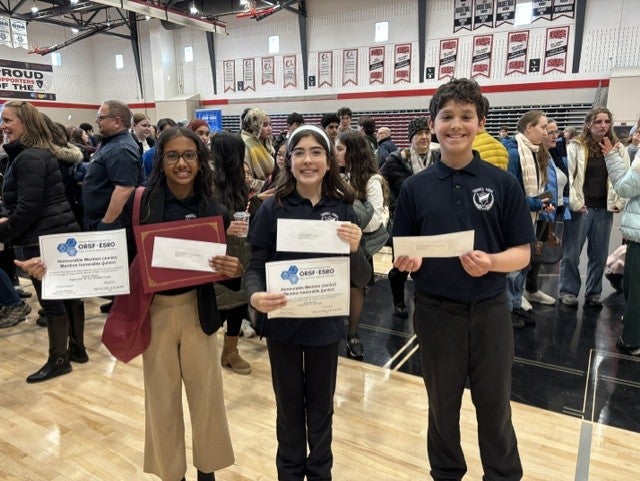 Tyler with Science Fair award and other award winners