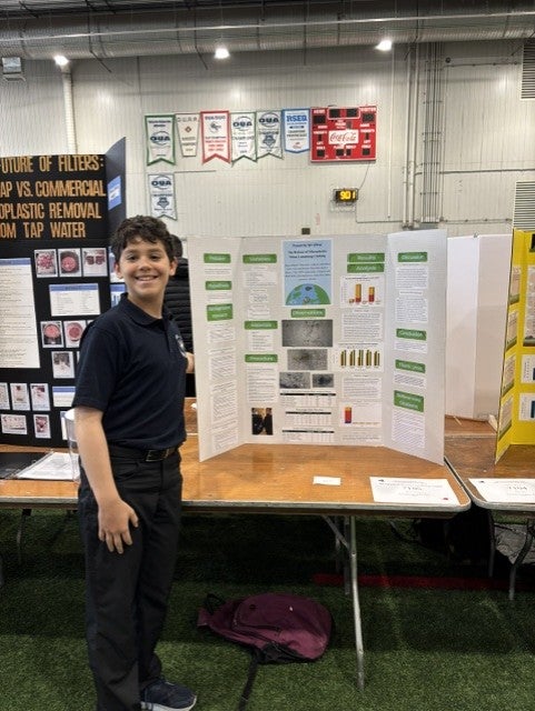 Tyler with his project at the Ottawa Science Fair