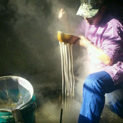 Local farmer from Sanggang village making sweet potato noodles