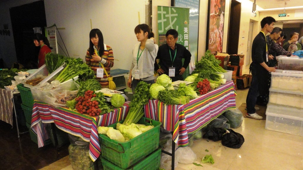 Vegetable vendor at Beijing Organic Farmers' Market