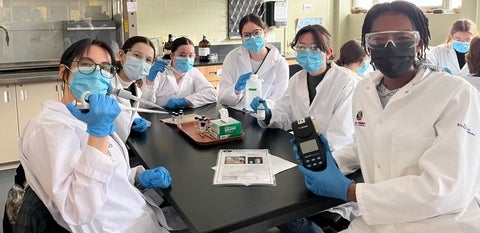 Students conducting chemical analysis on water samples from Laurel Creek