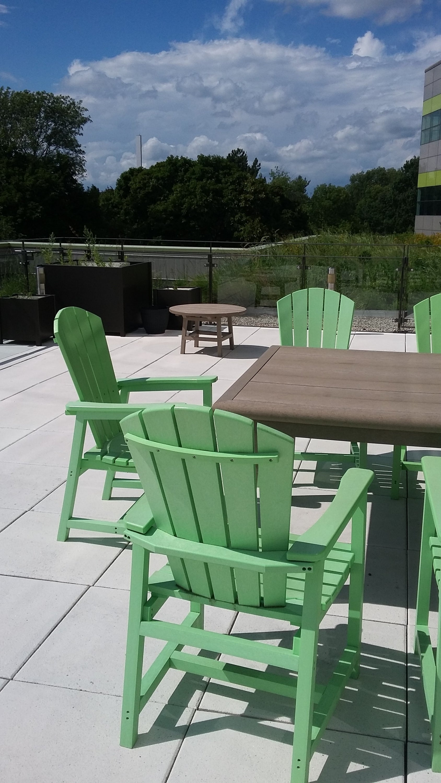 lime green lawn chair on the green roof