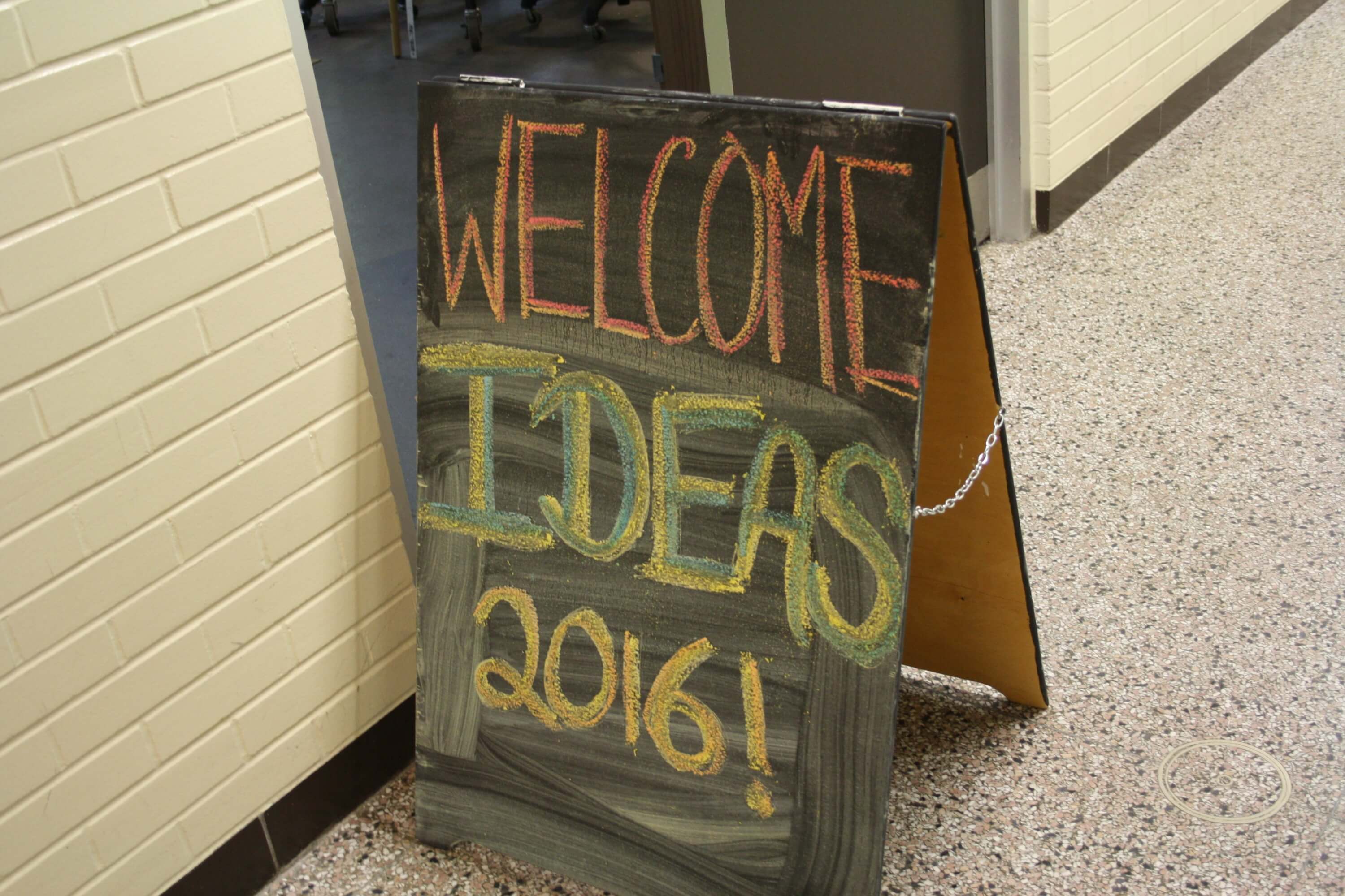 Chalkboard sign with "Welcome IDEAS 2016!" written on it