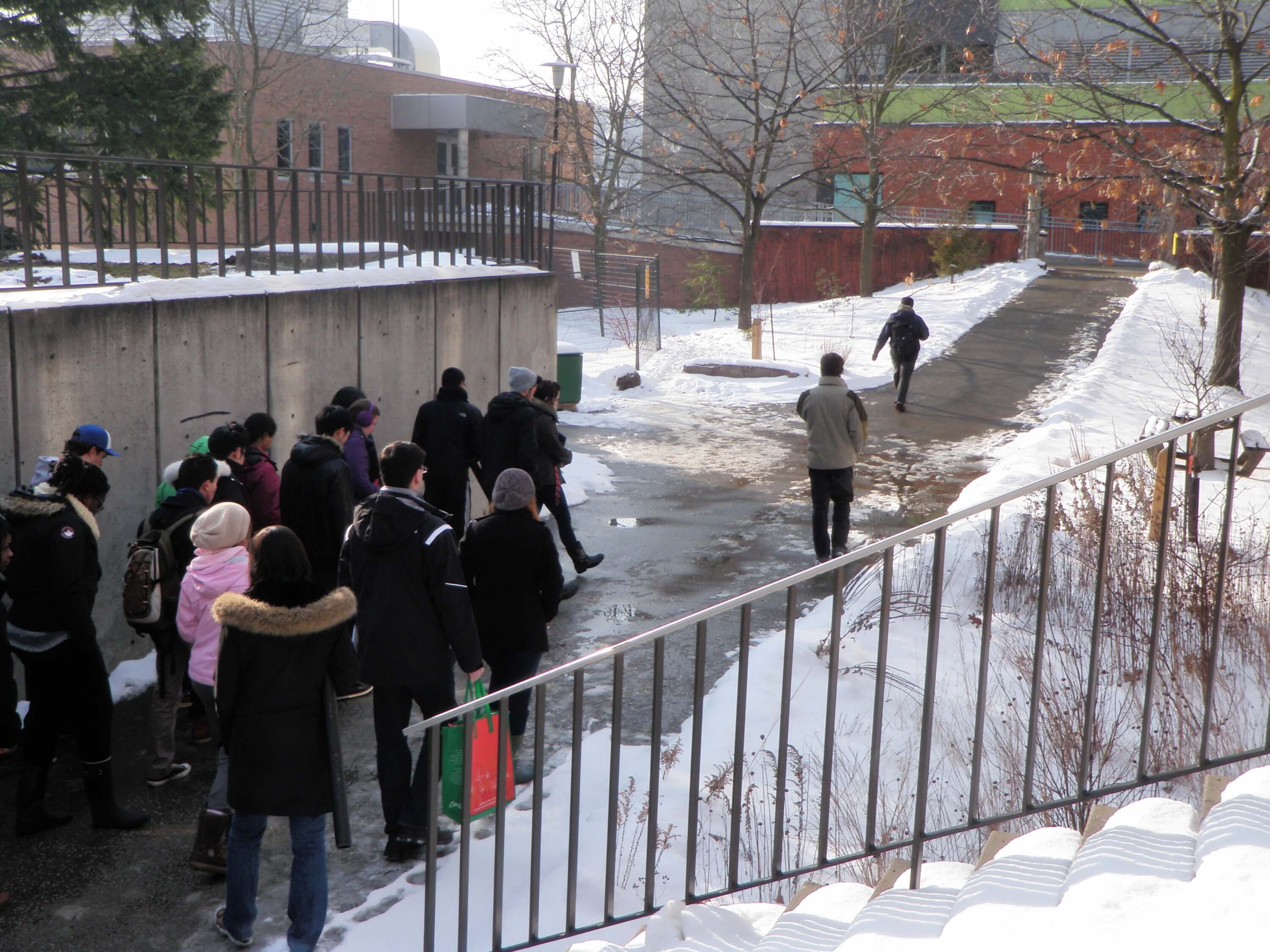 Students touring campus in winter
