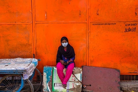 A masked woman in New Delhi, India