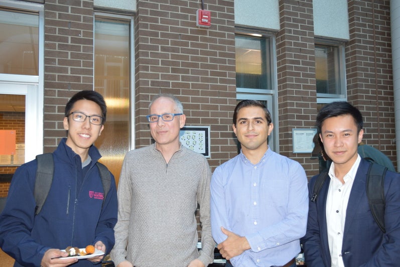 Faculty and members of the Waterloo Economics Society at the reception.