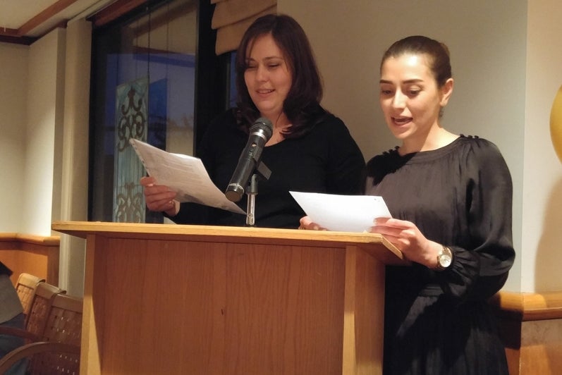 Photo of Allison Mascella and Ghazal Memartoluie at podium