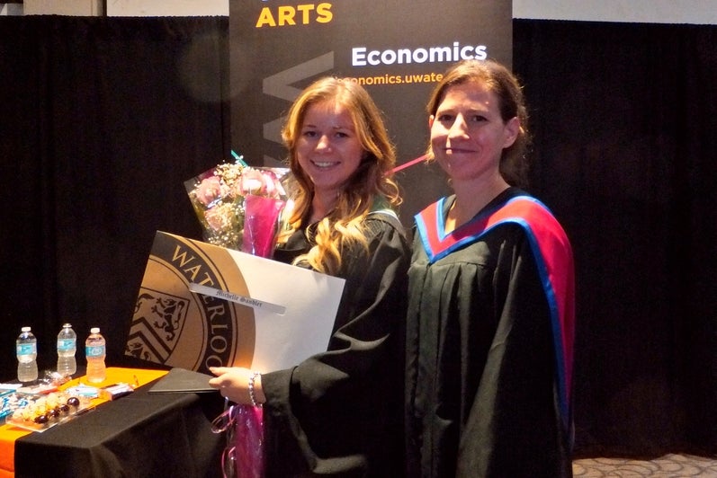 Professor Kate Rybczynski with recent economics graduate