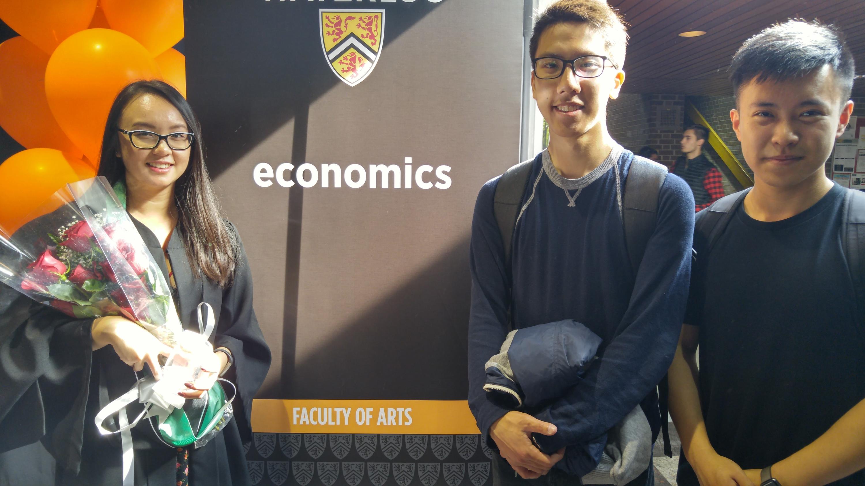 Students from Waterloo Economics Society congratulate the graduates.