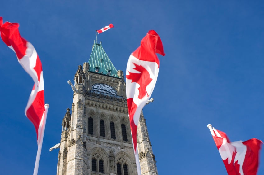 Parliament building with flags