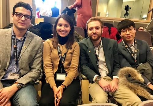 Four graduate students at Datafest