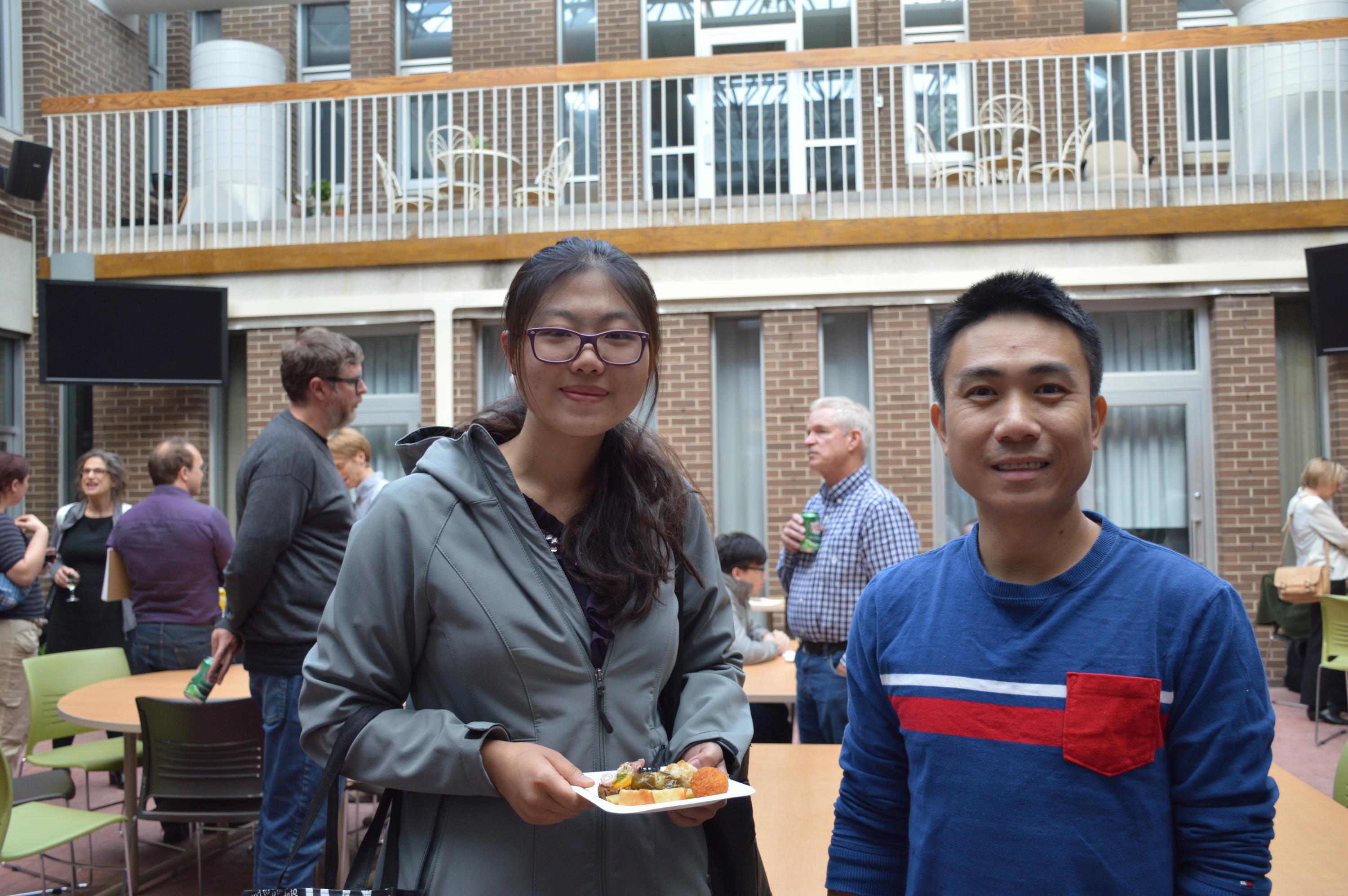 Students enjoying appetizers at the distinguished lecture reception.
