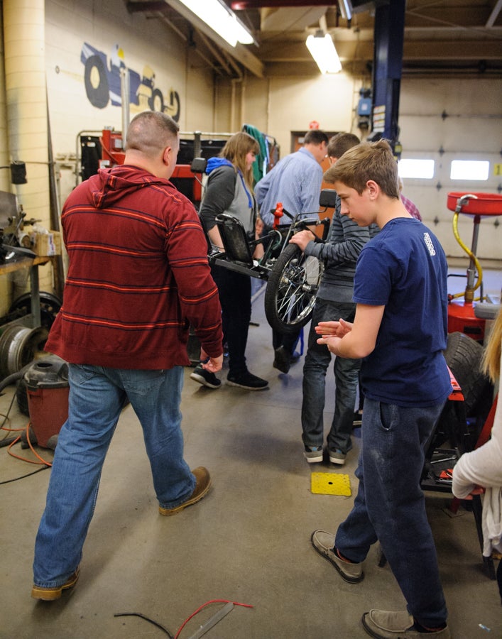 Team working on their electric car