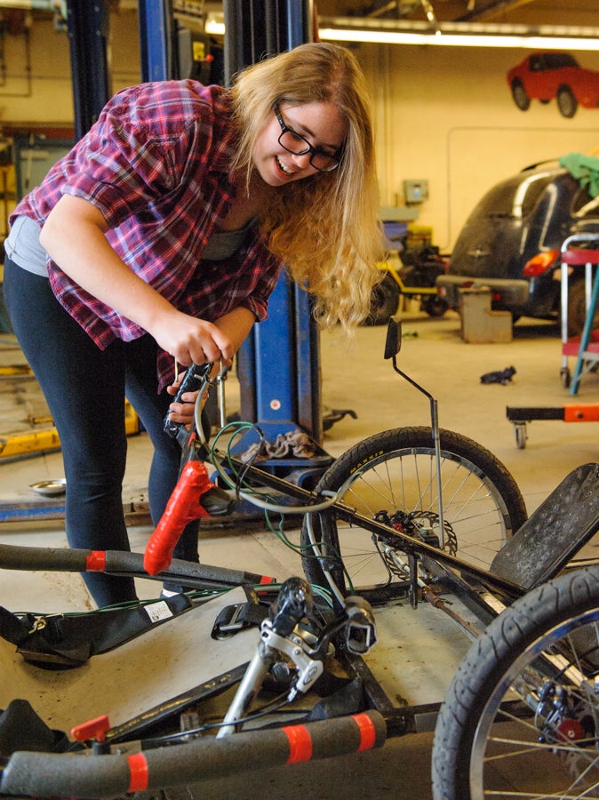 Student working on the vehicle