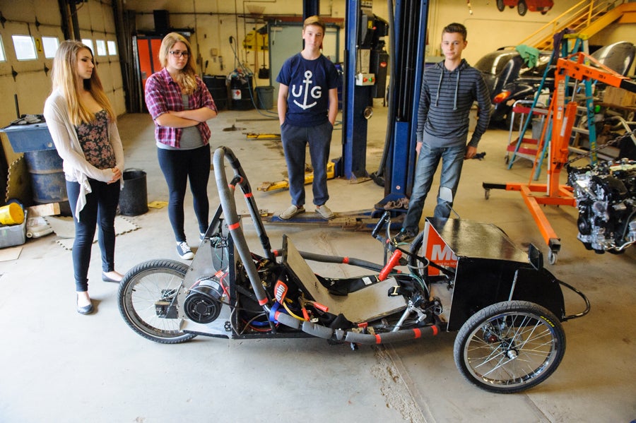 Students with their car