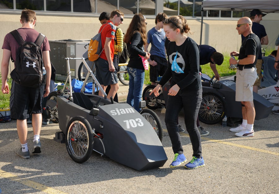 SJAM team working on their car