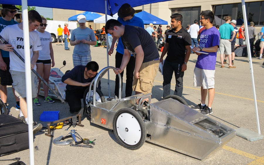 Team working on their car