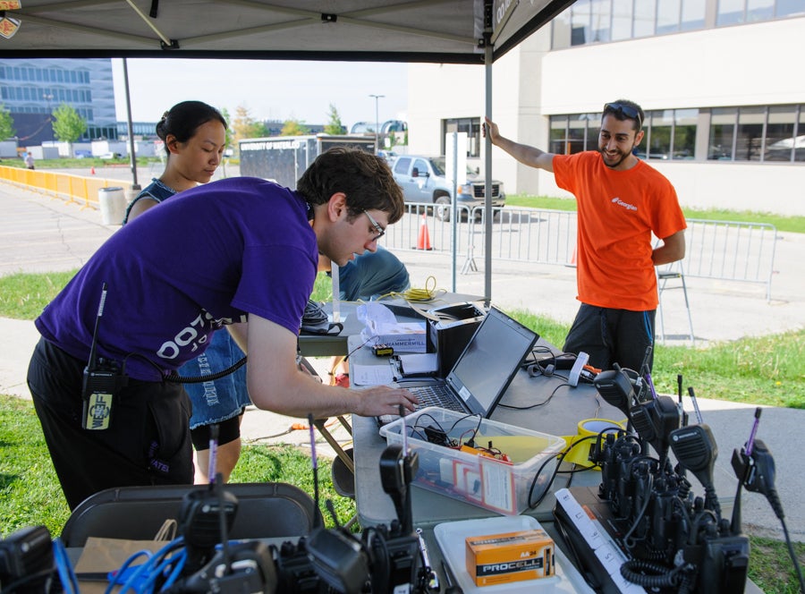 Scoring team preparing the system