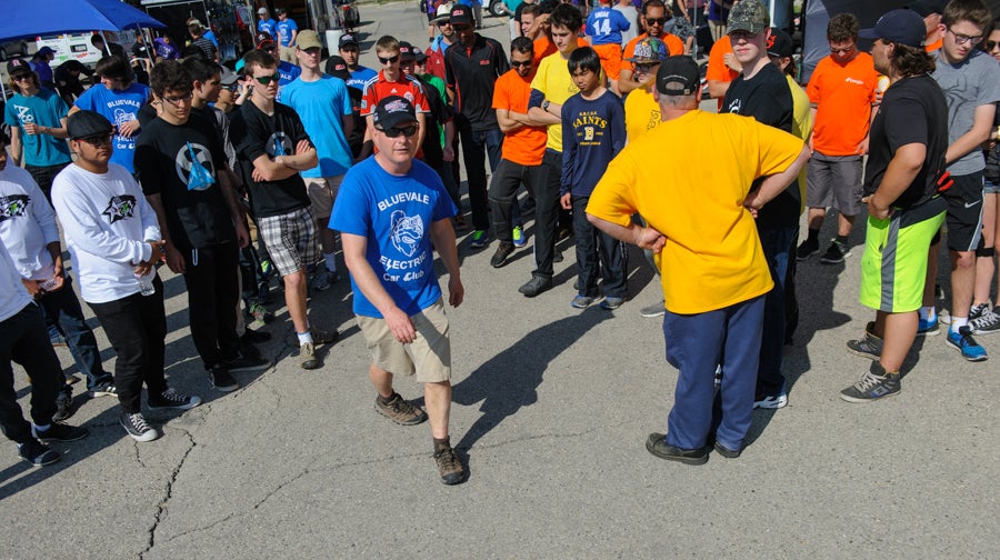 Jamie Cox leading teams around the track