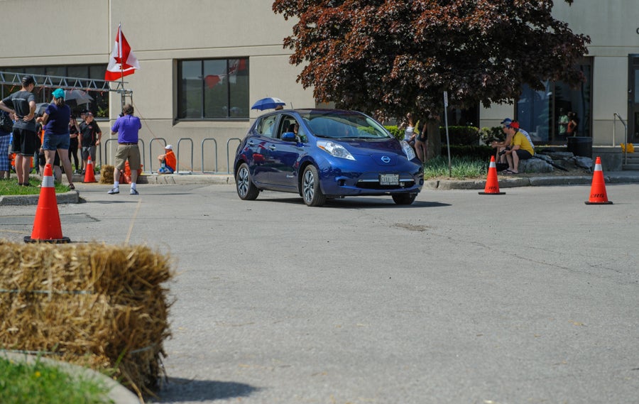 The pace car leads the way off the start/finish line