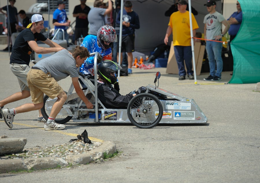 Pushing a car out of the pits