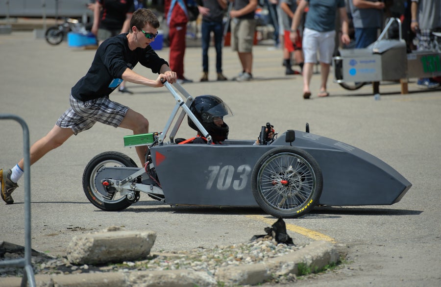 SJAM pushes their car out of the pits