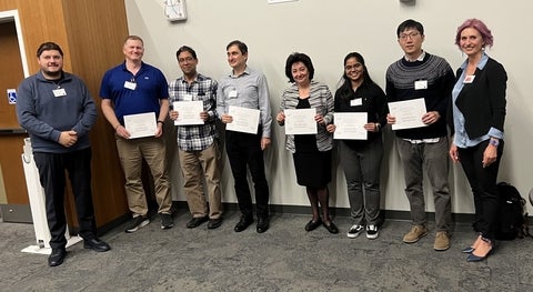 Recipients of the Best paper award with their certificates