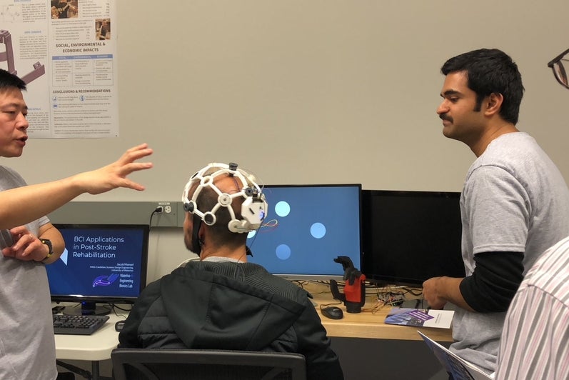 Ning explaining how EEG cap works