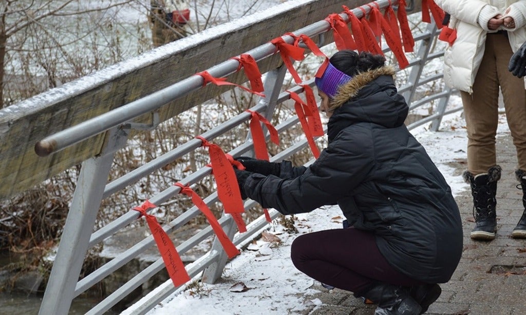 Bridge ceremony and tying of red ribbon