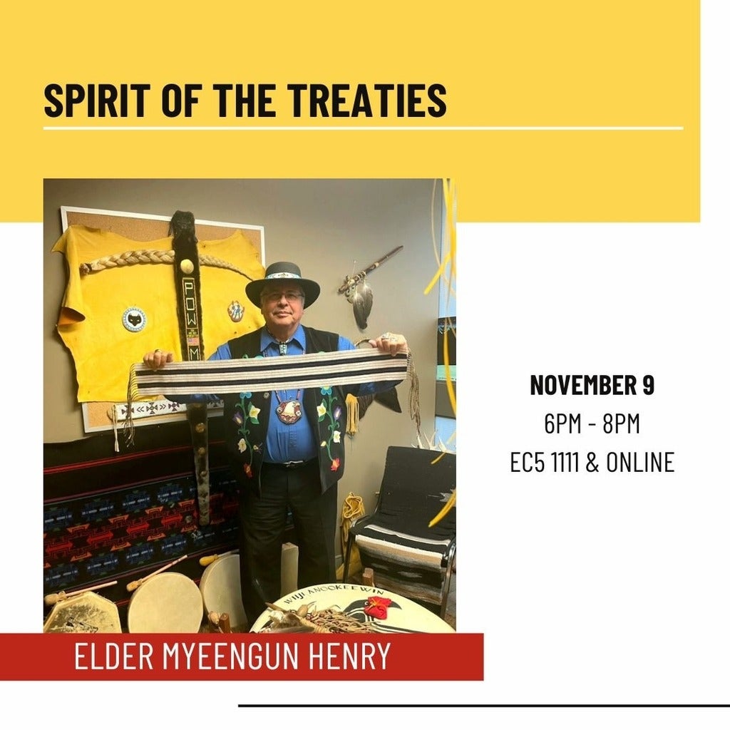 Elder Myeengun Henry holding the two row wampum belt