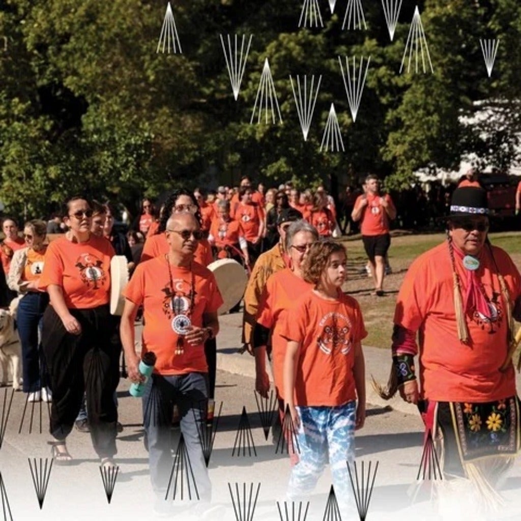 Vivek Goel, Jean Becker, Myeengun Henry leading the National Day for Truth and Reconciliaton walk