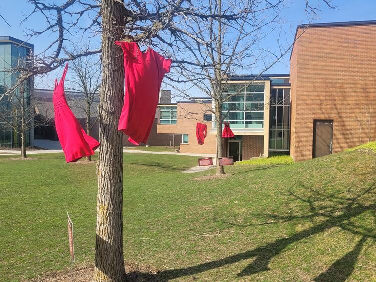 Red dresses on BHM green