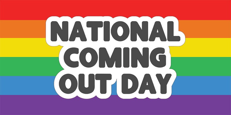 Rainbow pride flag with the words "National Coming Out Day" on top. 