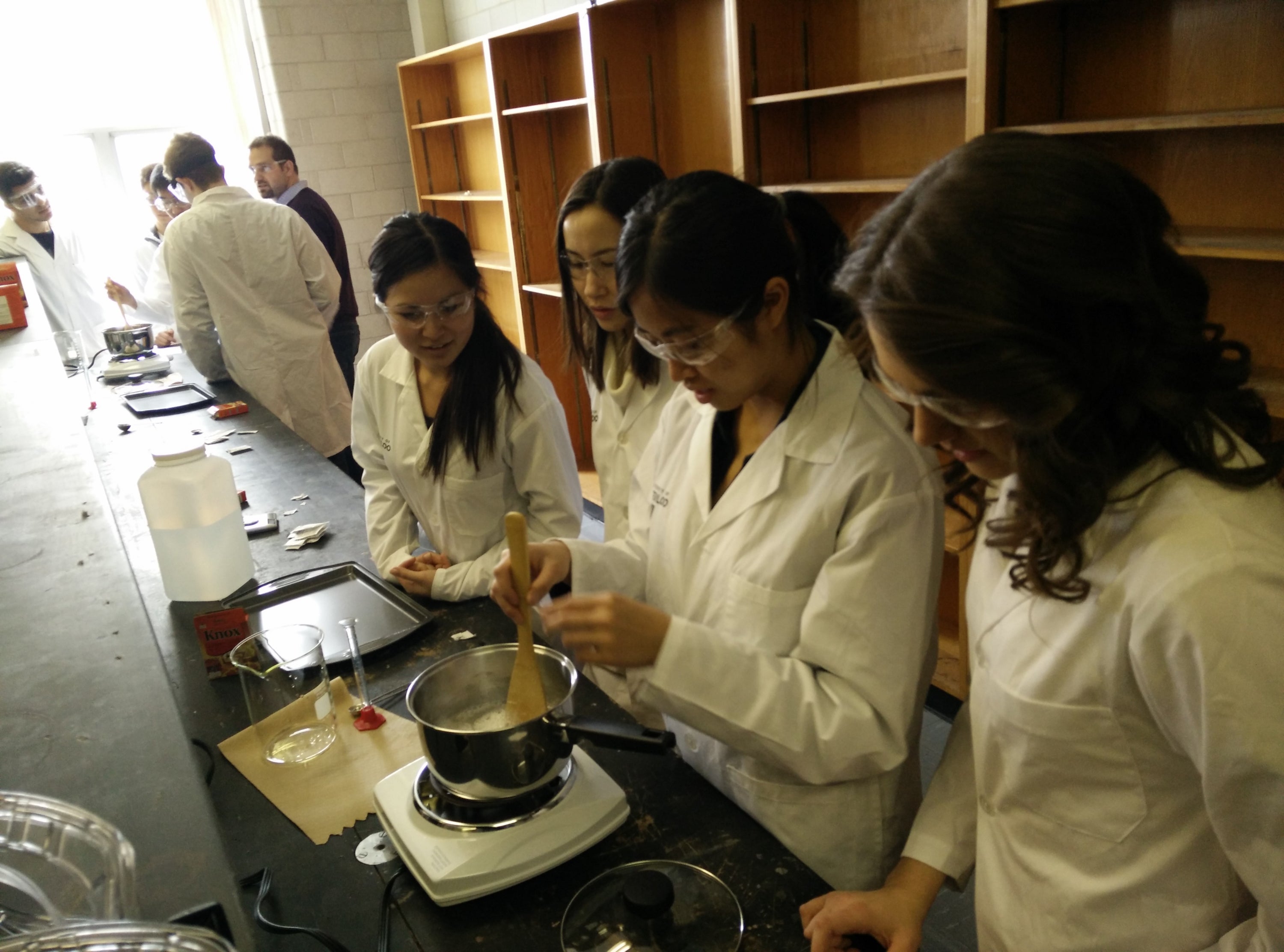 Students curating bioplastics solution.