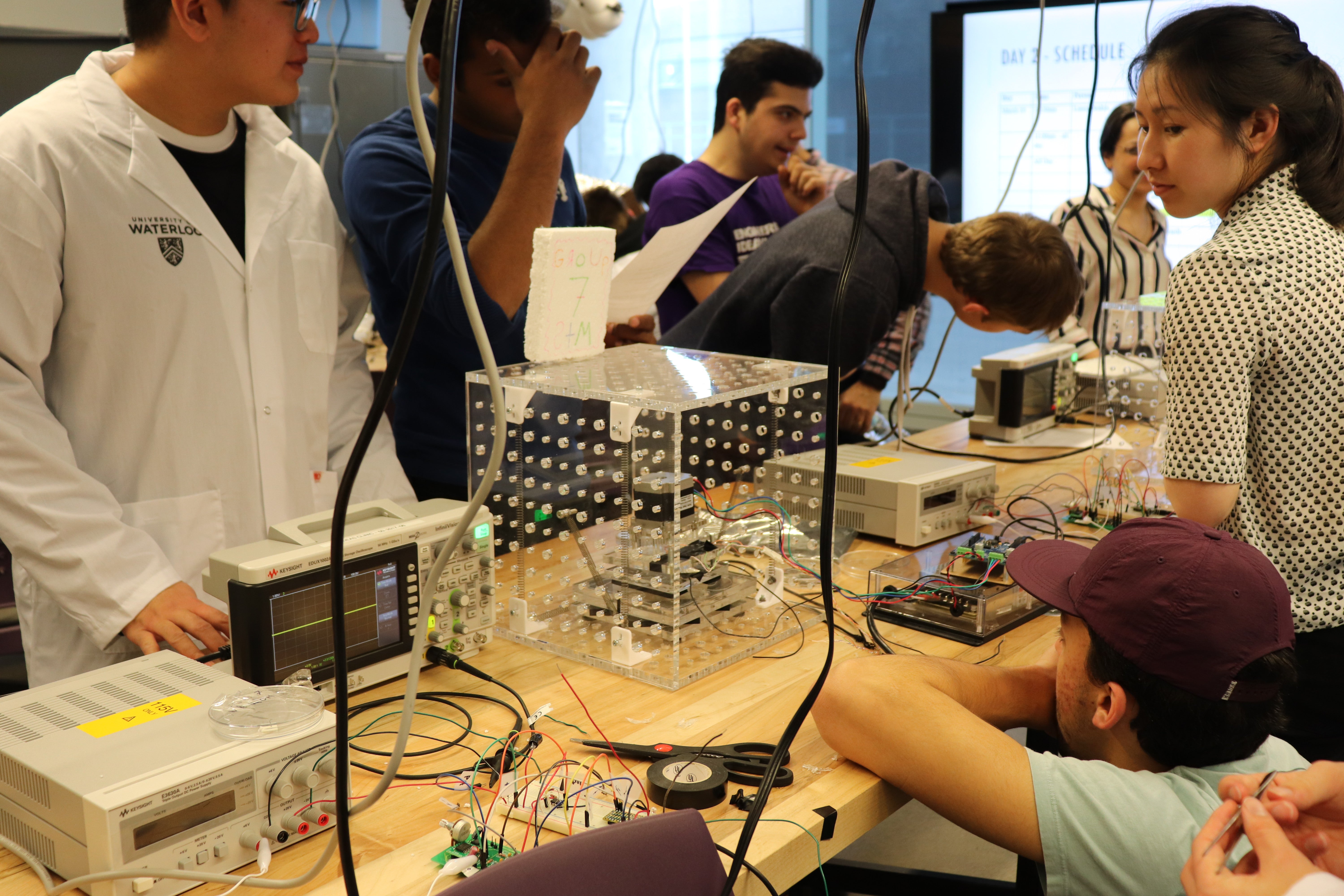 Students working on scanning tunneling microscopes in Nano Engineering Design Days