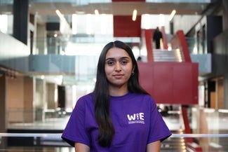 Girl in purple tshirt smiling