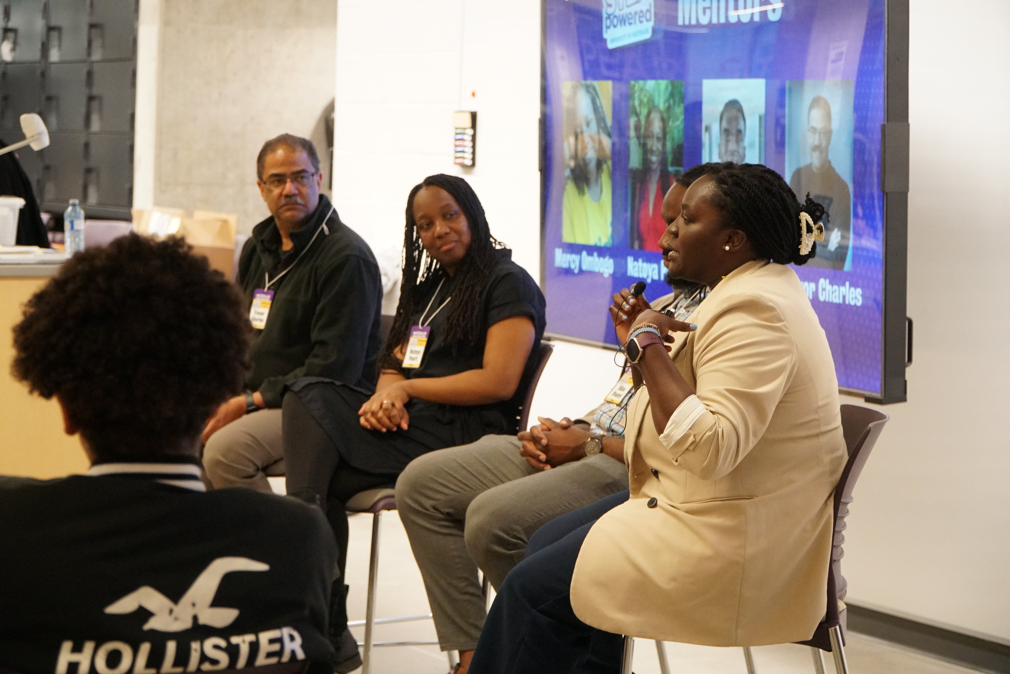 Mentors talking to STEMpowered conference