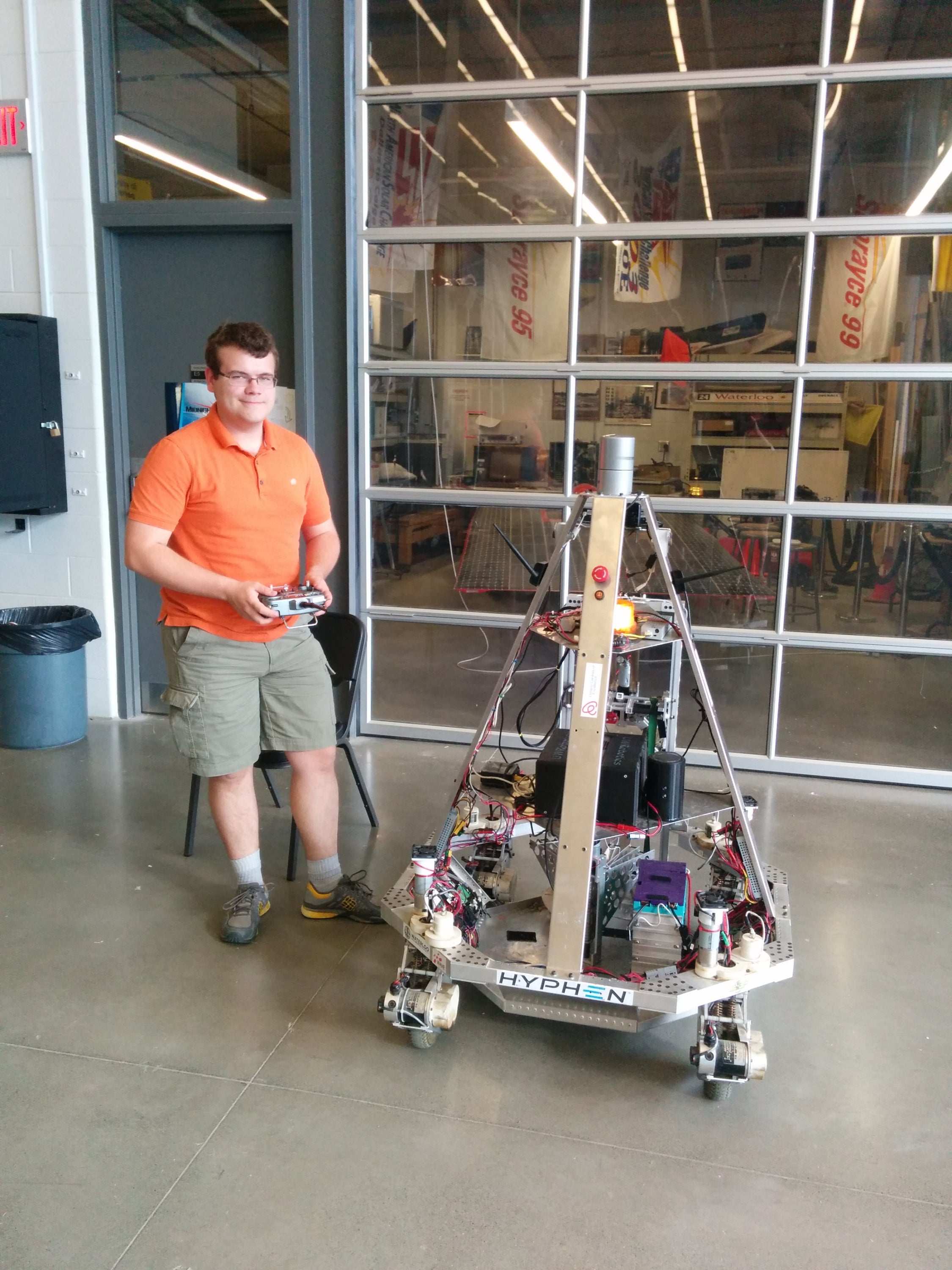 Stuart with one of the team's autonomous robots